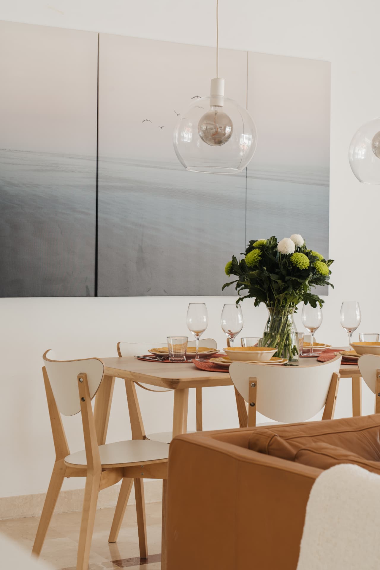 Dining area with sea artwork