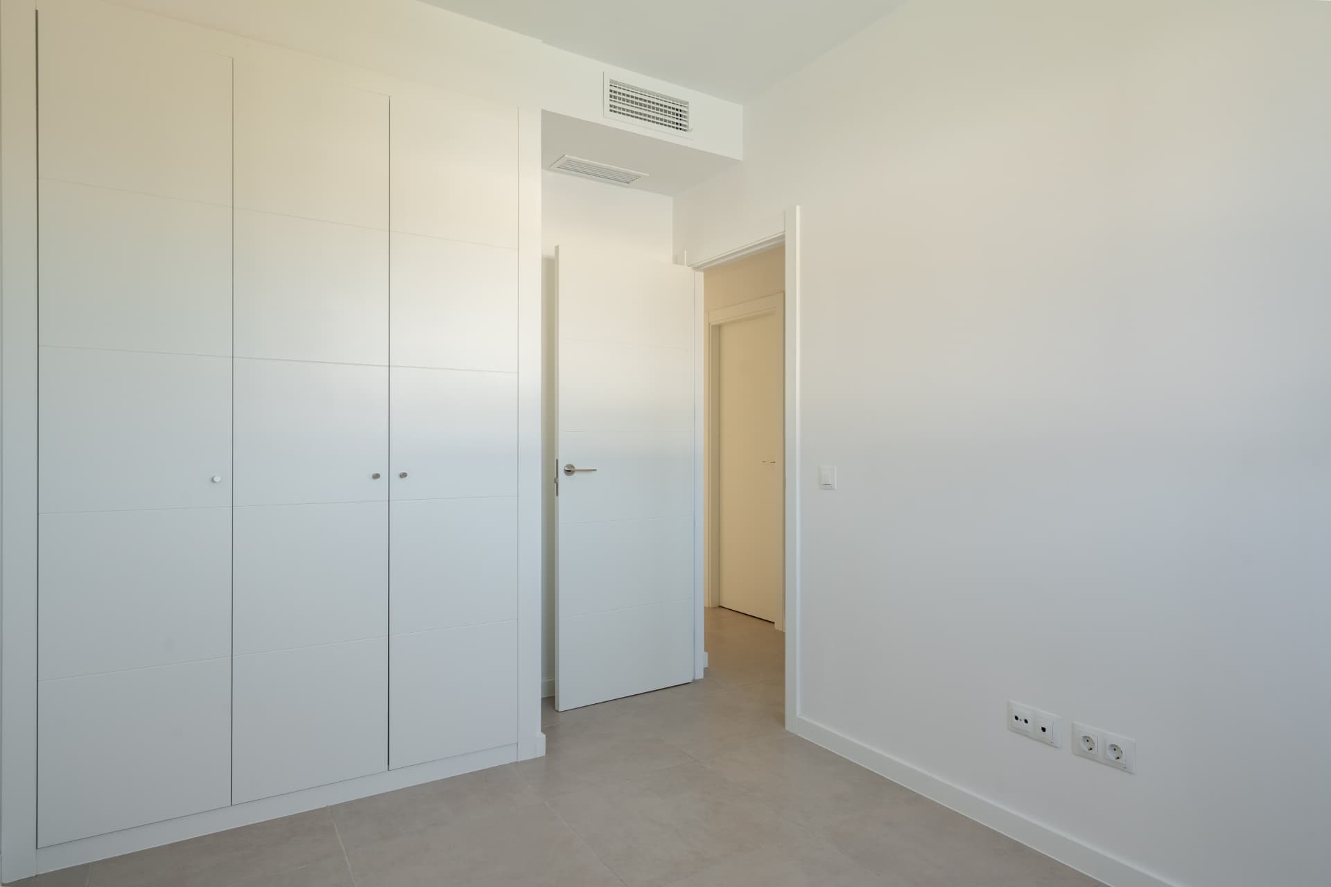 Bedroom with built-in fitted wardrobes